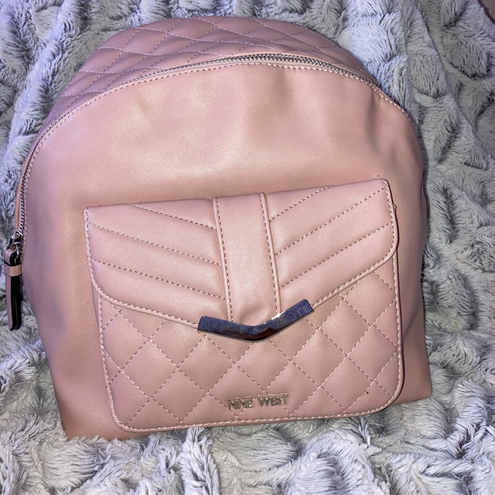 Pink never used Nine West backpack !!